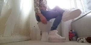 Crossdresser in tight Jeans and Sneakers