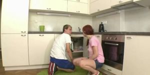 Plumber fucks a busty cougar in her kitchen - video 1