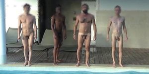 Four men at swimming pool