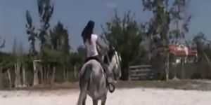 My naked asian girlfriend riding horse