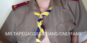 Japanese student slave in uniform tape gagged and riding on dildo