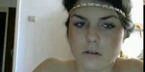 Busty reveals her pussy to the webcam