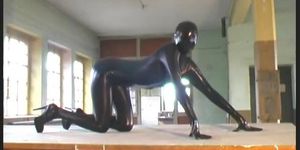 Redhead in Black Catsuit