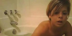Young girl orgasms in the bath tub