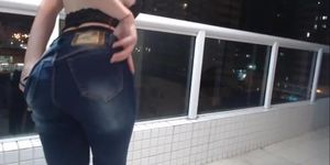 hot girl taking off her perfect body jeans