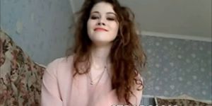 Pretty teen with curly hair teasing