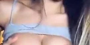 Pretty brunette amateur girl gets her boobs out on webcam