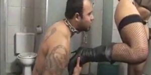 Tied up with a chain man fucked by a tranny mistress