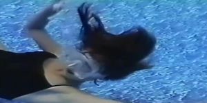 Sexi woman underwater swimming vintage
