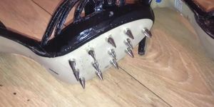 Spiked sole high heels asking to be trampled with