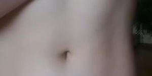 Pale boobs of nacked teen in front of camera