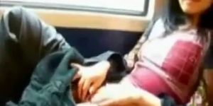 Asian milf rubs her clit on a train - video 2