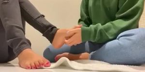 21 year old sisters tickle each other’s feet