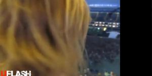 Girl strips at a stadium