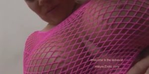 Big boobs blonde milf in fishnet nightie spreads gorgeous legs