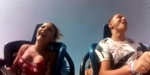 Sexy boobs fall out on a rollercoaster