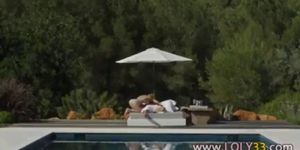 Super sexy couple copulating by the pool