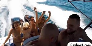 Pretty college teen girls enjoy group sex on speed boat