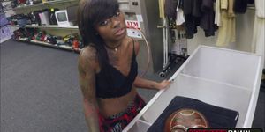 Ebony babe Lexxi Deep gives a bj under the counter