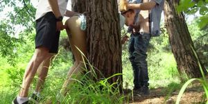 Two guys caught a blonde and fucked her in the woods