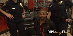 Busty cops catch criminal suspect as he is getting a haircut