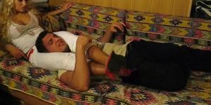 miXed wrestling-scissored captive knockout on couch