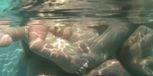 Young lezzie threeway underwater with dildo