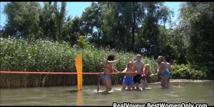 Interracial Nudists Playing Games In River Voyeur