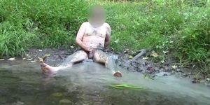 The Mud Bath -Sexy Nature Guy plays in the mud