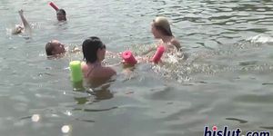 Raunchy babes have fun in the water