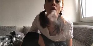 Beautiful young schoolgirl smoking sexy
