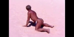 Tanned guy on beach in tiny string thong temporarily (amateur )