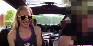 Blonde shows natural tits inside the car