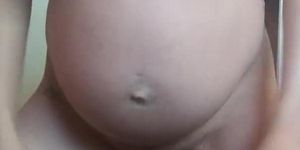 8 months pregnant hot MILF girl getting to business with big dildo