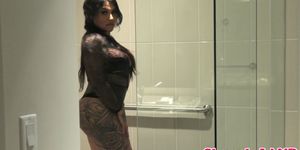 Inked tgirl amateur tugging in the shower