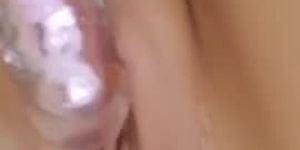 Close up pussy lips and big dildo