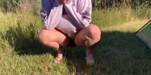 cute baby pissing outside
