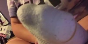 Friend worships her socked foot