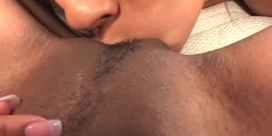 Sexy ebony gets lesbo pussy licked in close-up