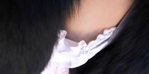 Busty Asian bunny stars in a sweet downblouse video