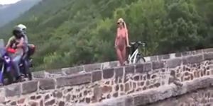 Naked and flashing doing cycling