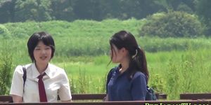 Uniformed asian teenagers piss outdoors