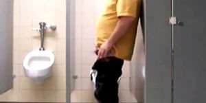 Masturbating in a public bathroom