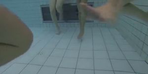 Teen gives Handjob in Public Pool