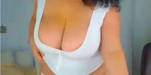 Sexy curvy huge breast MILF giving dildo a nice tit fuck