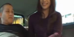 Asian milf sucking cock in car back seat