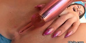 Kissable girl is gaping wet vagina in closeup and getting off