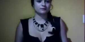 Cute Latina girl teases on webcam (Talia )