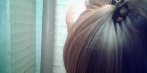 Young shaved pussy filmed in a public wc