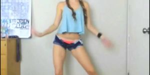 Dance Hot teen girl in pigtails does a sexy dance